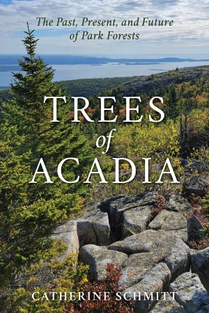 cover of book with Trees of Acadia in capital letters in white against a photo of a spruce tree, forested mountains, and the ocean in the distance